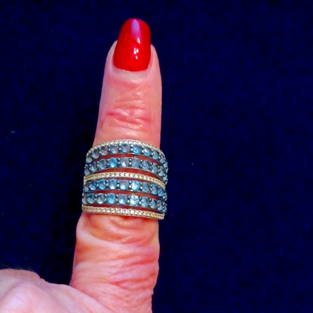 Wide band multi row blue topaz ring